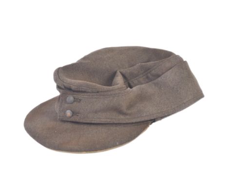 A WWII Second World War Third Reich Nazi German M43&nbsp;Wehrmacht forage&nbsp;cap. Khaki wool construction with front Eagle 