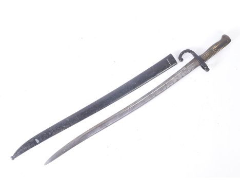 A 19th Century French 1866 pattern ' Chassepot ' rifle bayonet. The bayonet having ribbed brass hilt, muzzle ring and forward