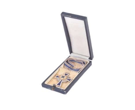 WWII Second World War Third Reich German Nazi ' Mothers Cross ' Cross Of Honour Of The German Mother medal. Enamel in blue an