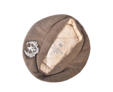 A vintage 1950s (1954) Cameronians Scottish Rifles Tam O' Shanter / Tammie cap. Khaki wool with a distinct flat shape, woolle