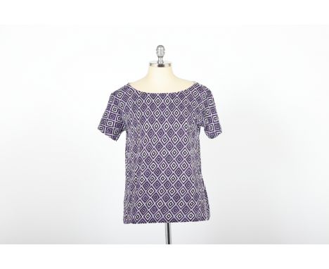 PRADA - TWO COTTON PRINTED T SHIRTS
Donated Anonymously
Both with short sleeves; one with a geometric print, othe other a che