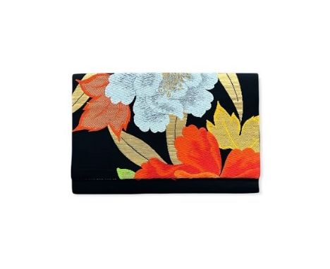 LAYARD INTERIORS - A VINTAGE UBI CLUTCH
Donated by Anna Layard
This exquisite, and totally unique evening clutch, was re-craf