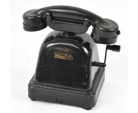 A vintage Bell telephone with side crank handle