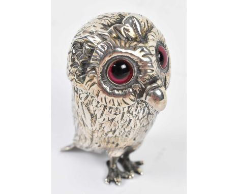 A Victorian hallmarked silver novelty pepper in the form of an owl with hinged cover enclosing a detachable liner with shaped