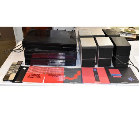 BANG &amp; OLUFSEN; a Hi-Fi system comprising three units, two remotes, original owner's manual and speakers.