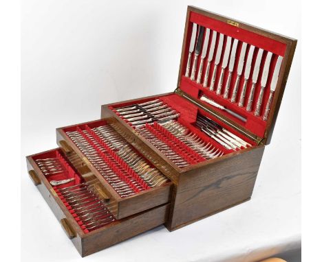 An oak cased silver plated canteen of cutlery, comprising approx. 100 pieces.