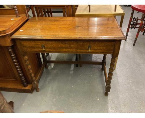 A early 20th century oak single drawer side table on bobbin turned legs, width 91cm.