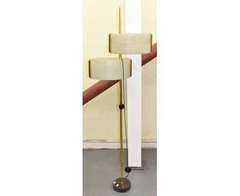 A contemporary retro style standard lamp with brass column and two oval perspex shades, height 178cm.