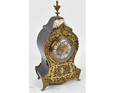 A late 19th century French Boulle Work mantel clock with Roman numerals to white enamelled hour marker and with eight day mov