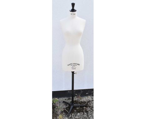 STOCKMAN, PARIS; an Haute Couture mannequin with stand.