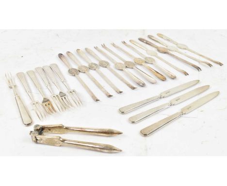 A set of twelve silver plated lobster pics, a pair of nutcrackers with sundry knives and forks.