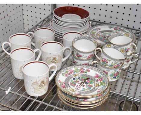 A Susie Cooper six-setting tea service comprising six cups, saucers and plates, and an Aynsley Indian tree six-setting tea se