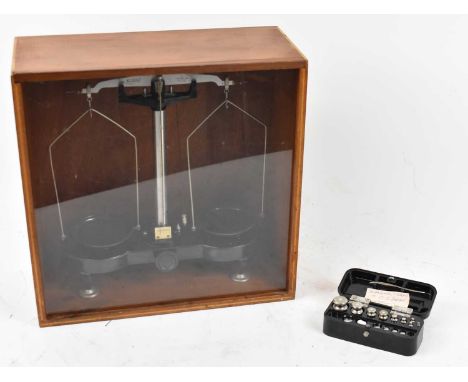 A set of Russian laboratory scales in case, with a box of weights.