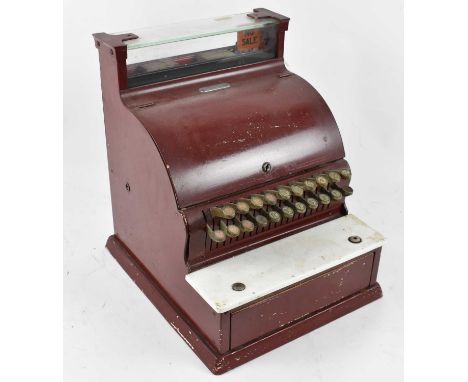 A vintage red painted cash register no.3605422, width 35cm.