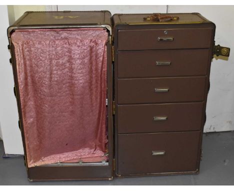 WHEARY; an early 20th century brass bound travelling trunk, with fitted interior enclosing five drawers and hanging space, 10