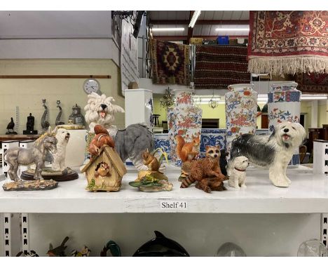A group of ten ceramic models of predominantly dogs, also squirrels and a raccoon (10).