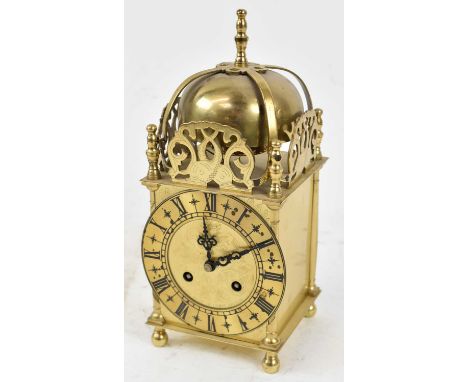A brass cased mantel clock with Roman numeral dial, height 24cm.
