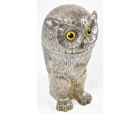 An exceptionally rare and very large hallmarked silver novelty wine cooler modelled as an owl, the textured cover modelled as