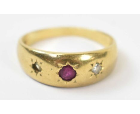 An 18ct yellow gold ring with central red stone and two smaller white stones (af), size K, approx 5.4g.Condition Report: One 