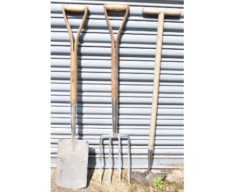 A Makita circular saw (untested) and three garden tools.