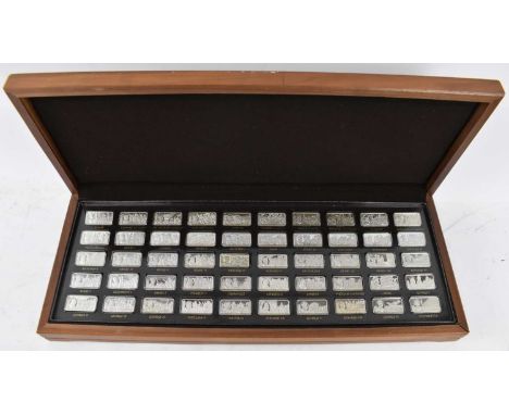 A limited edition Thousand Years of British Monarchy sterling silver proof edition fifty ingot set, no.1872, contained in a v