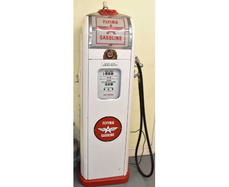 A reproduction 'Flying Gasoline' petrol pump, height approx to top of light fitment (lacking globe shade).