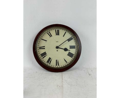 A early 20th century wall clock with painted Roman numeral dial.