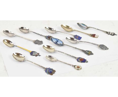A group of hallmarked silver and enamelled commemorative spoons, two 800 grade enamelled commemorative spoons and a silver pl