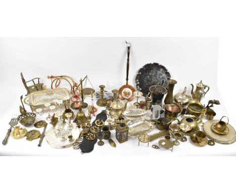 A large quantity of metalware and silver plated items, including candlesticks, teapots, etc.
