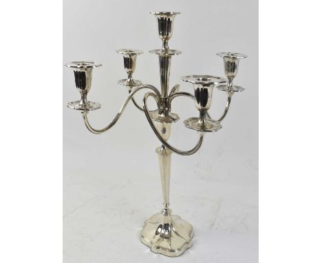 WALKER &amp; HALL; an Edwardian hallmarked silver four branch five light loaded candelabrum, Sheffield 1907, height 15cm, the