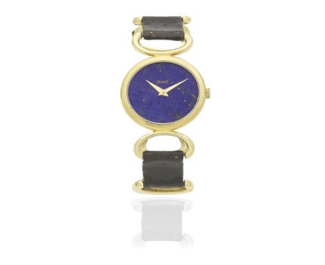 Piaget. A lady's 18K gold manual wind wristwatch with lapis lazuli dialReference: 9802Date: Circa 1980Movement: 18-jewel Cal.