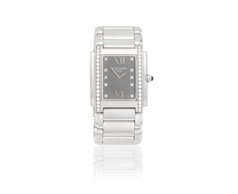 Patek Philippe. A lady's stainless steel and diamond set quartz rectangular bracelet watchModel: Twenty-4Reference: 4910/010D