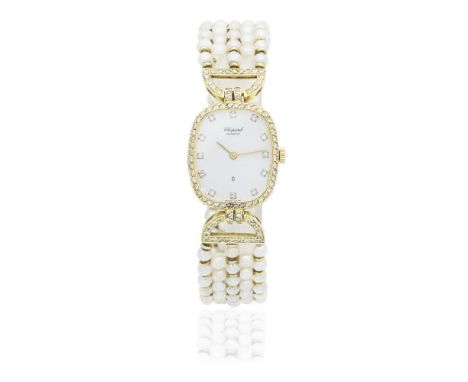 Chopard. A lady's 18K gold and diamond set quartz watch with pearl set braceletReference: 5147Date: Circa 1990Movement: 7-jew