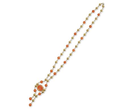 Baume &amp; Mercier. An 18K gold and coral manual wind pendant watchReference: 429291Date: Circa 1970Movement: 17-jewel Cal.6