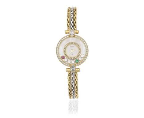 Chopard. A lady's 18K two colour gold diamond set quartz bracelet watch with free floating ruby, emerald and diamondsModel: H