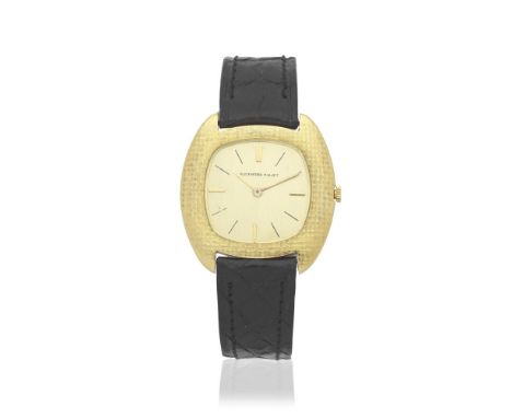 Audemars Piguet. A slim 18K gold manual wind cushion form wristwatchDate: Circa 1970Movement: 17-jewel Cal.2003 manual wind, 