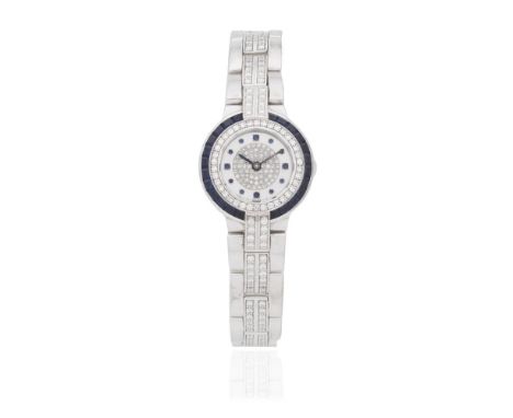 Patek Philippe. A lady's 18K white gold diamond and sapphire set quartz bracelet watch with sigma dialReference: 4785 1Date: 