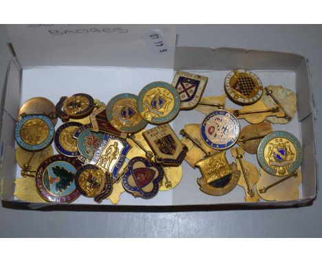 A collection of various enamel badges, bowling club and other interest