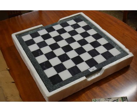 A modern polished stone chess set