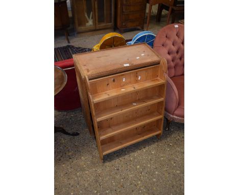 A 20th Century pine wall shelf together with a small pine bookcase (2)