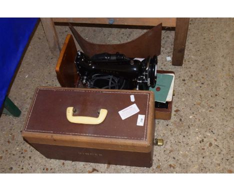 A SInger sewing machine in original case