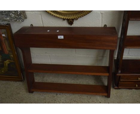 A hardwood wall shelf
