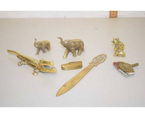 A collection of various brass animals, paper knife, nut cracker etc