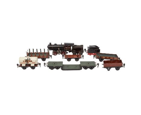 MÄRKLIN Konvolut aus 20-Volt Dampflok und 6 Güterwagen, Spur 0, schwarze Dampflok mit Tender 'R 13040', 1926-31, Birne der St