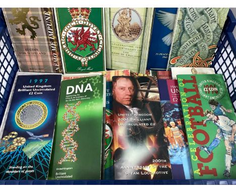 Collection Of Twenty Royal Mint Bunc Coin Packs, including 1999 Rugby £2, DNA £2, various £1 and £2 coins.