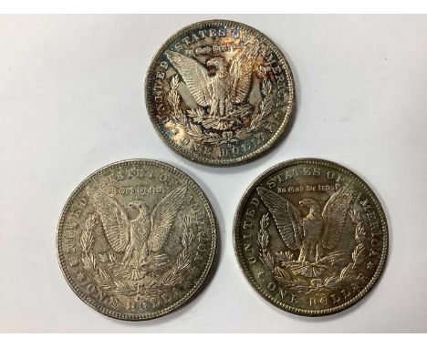 Three USA Silver 'Morgan' Dollars, 1878, 1883 and 1885.