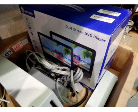 Boxed in car dual screen DVD player and a Nintendo Wii with cables, no controller. All electrical items in this lot have been