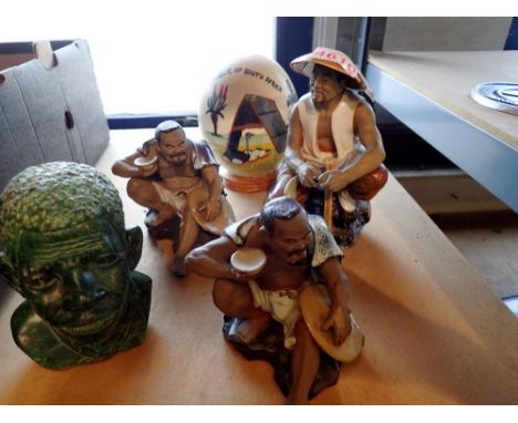 Three oriental Mud men figures with a green resin bust and a South African souvenir item (5). Not available for in-house P&am