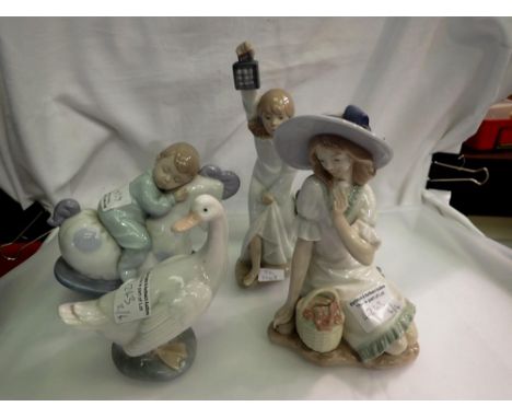 Four Nao figurines to include a girl and her dog, searching with a lamp. Not available for in-house P&amp;P 