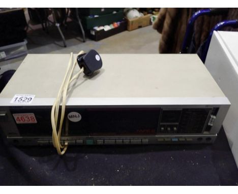 Sharp stereo cassette deck model RT1010H(S). All electrical items in this lot have been PAT tested for safety and have passed